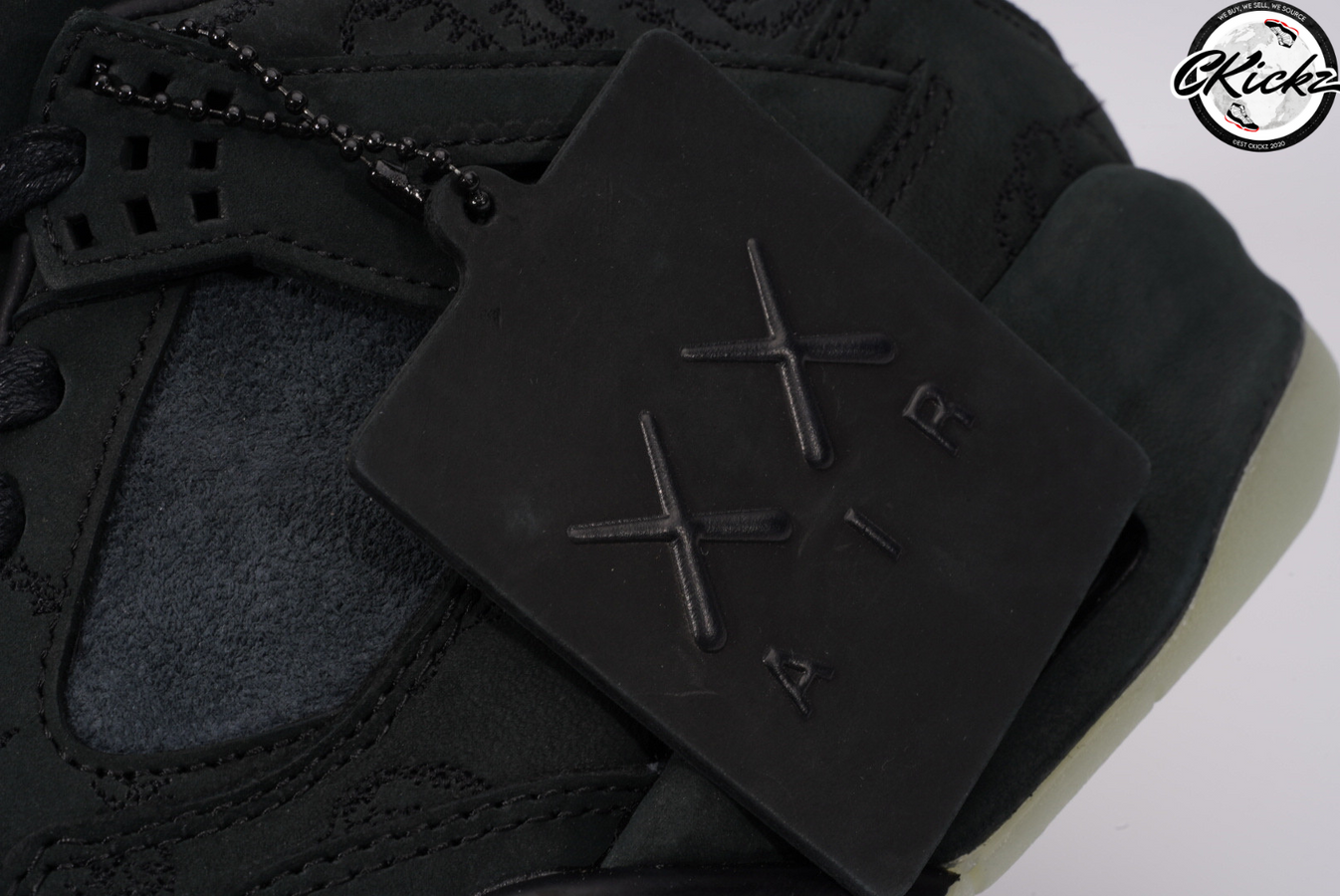 j4 kaws black